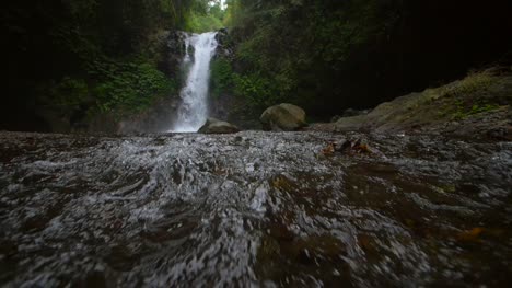 Reveal-Shot-of-a-Woodland-Waterfall