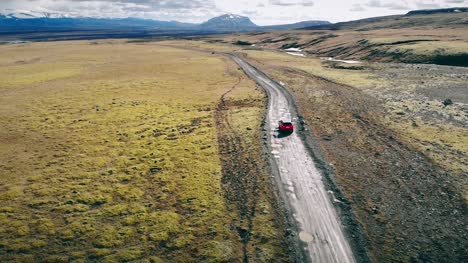 Red-Car-Driving-Through-Iceland-