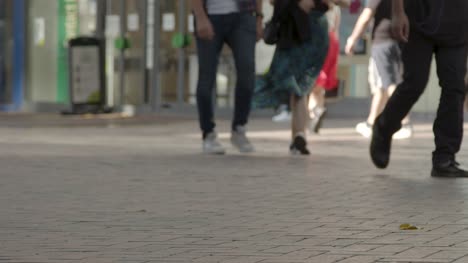 Defocused-Shot-of-Feet-Walking-In-Busy-Road-In-Birmingham